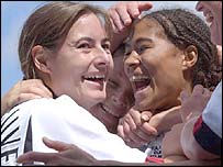 Fulham Ladies congratulate Kim Jerray-Silver for her winning penalty