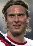 Fulham loan link Christian Poulsen